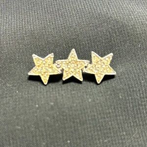 VTG Signed Silver Tone Metal and Rhinestone Star bar brooch. By Sarah Coventry.